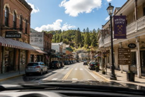 Driving through historic downtown Amador County with vintage buildings, small shops, and Gold Rush-era architecture